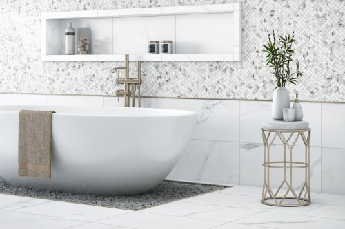 Carrara tile surround - free standing tub with niche