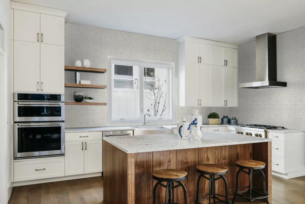 kitchen with white mosaic tile and wood floor