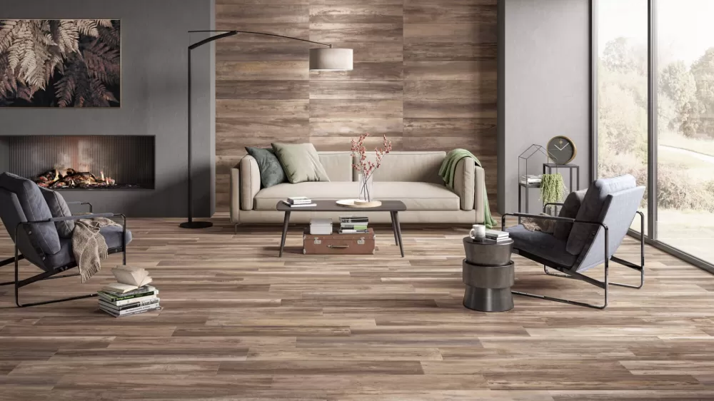 Modern living room with Enchant wood look tile on the floor and wall.