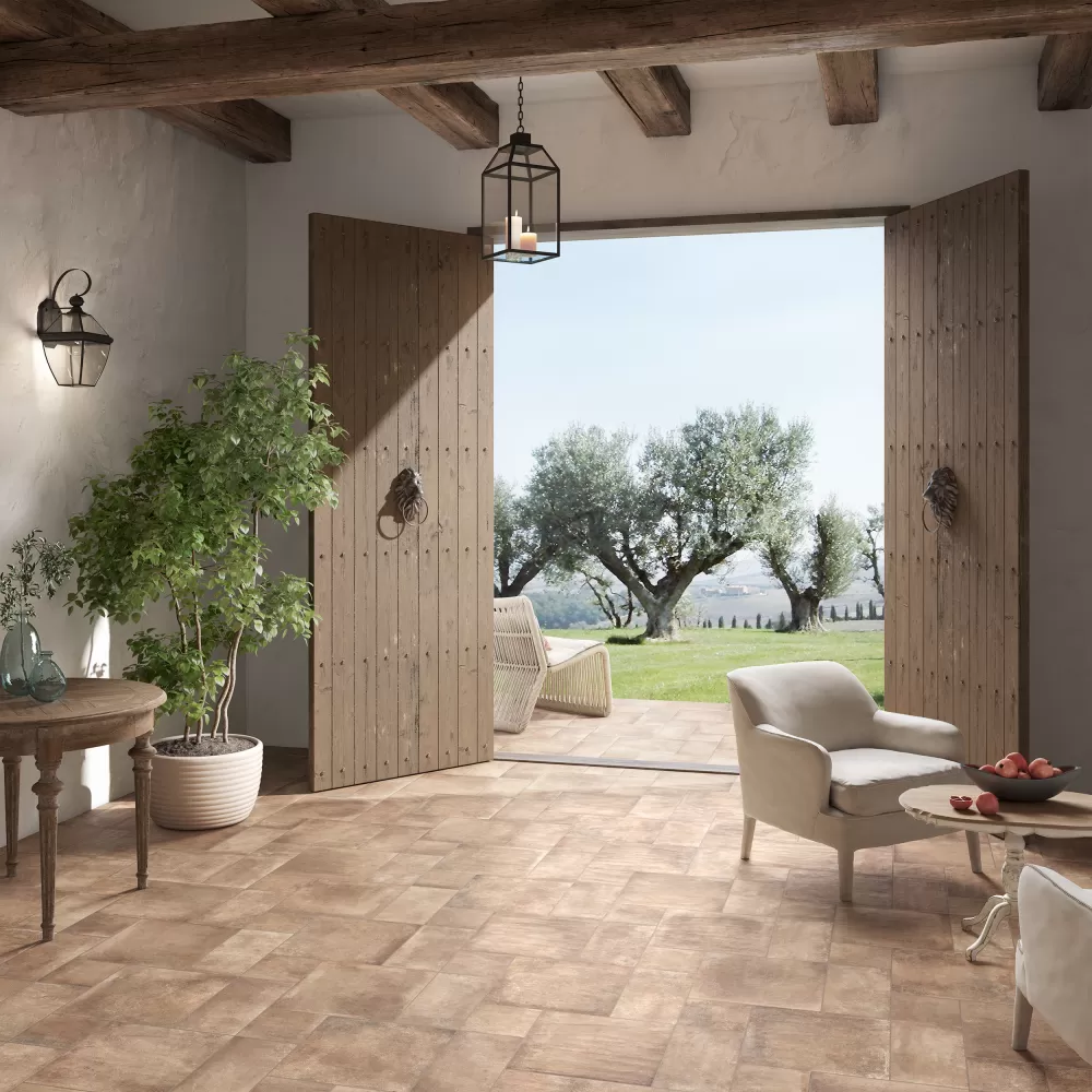 Terracotta living room floor that opens to olive trees backyard