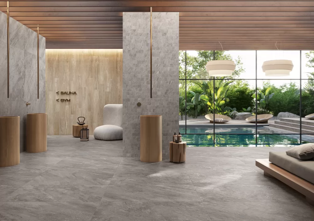 Spa with a swimming pool with a greige floor and wall stone look