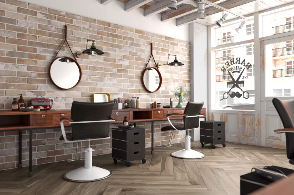 Barber shop with a rustic brick wall in beige and white tones